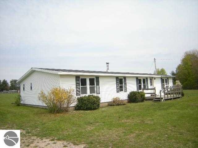 1369 E Duck Lake Rd, Grawn, MI 49637