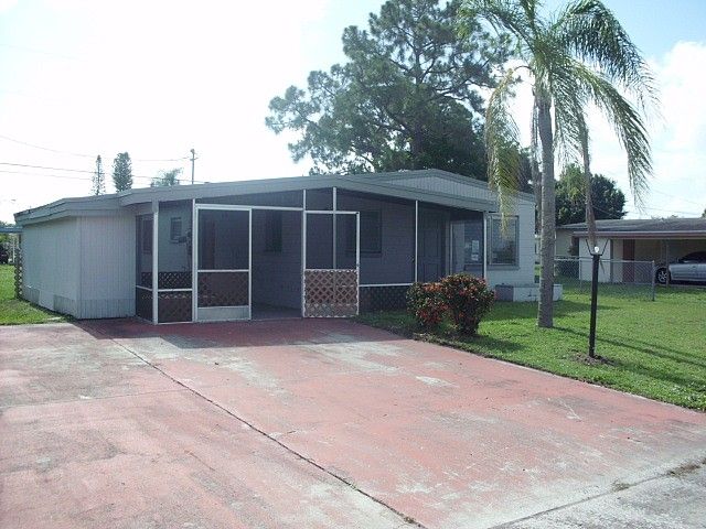 124 Apache St, Lehigh Acres, FL 33936