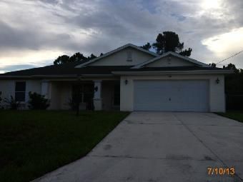 841 Spaulding St E, Lehigh Acres, FL 33974