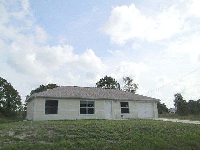 959 Candlelight Dr, Lehigh Acres, FL 33974