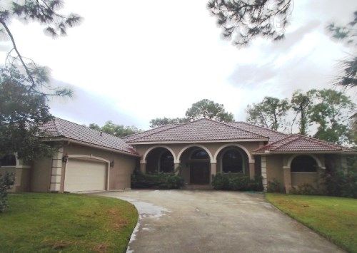 9165 The Lane, Naples, FL 34109