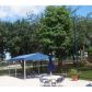 591 RACQUET CLUB RD # 4, Fort Lauderdale, FL 33326 ID:9522415