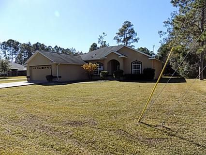 34 Rainbow Ln, Palm Coast, FL 32164