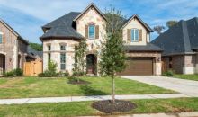 511 BLOSSOM COVE COURT Pinehurst, TX 77362